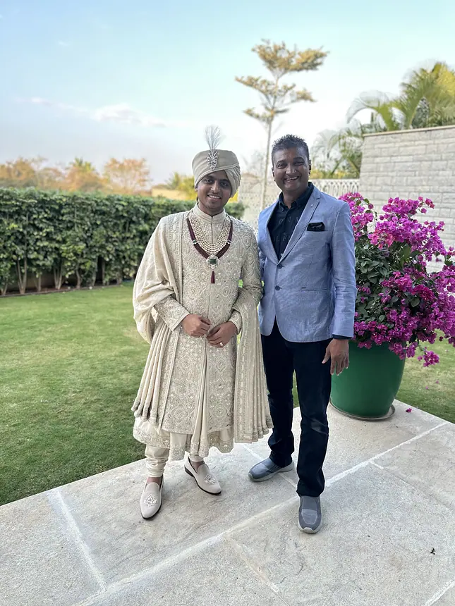 Groom in ivory sherwani with Kishore