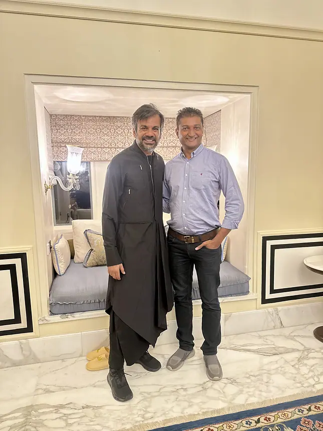 Kishore with a client