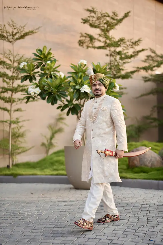 Groom walking with a sword