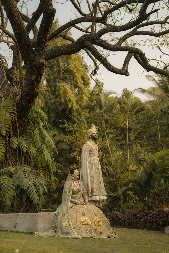 Couple under a large tree