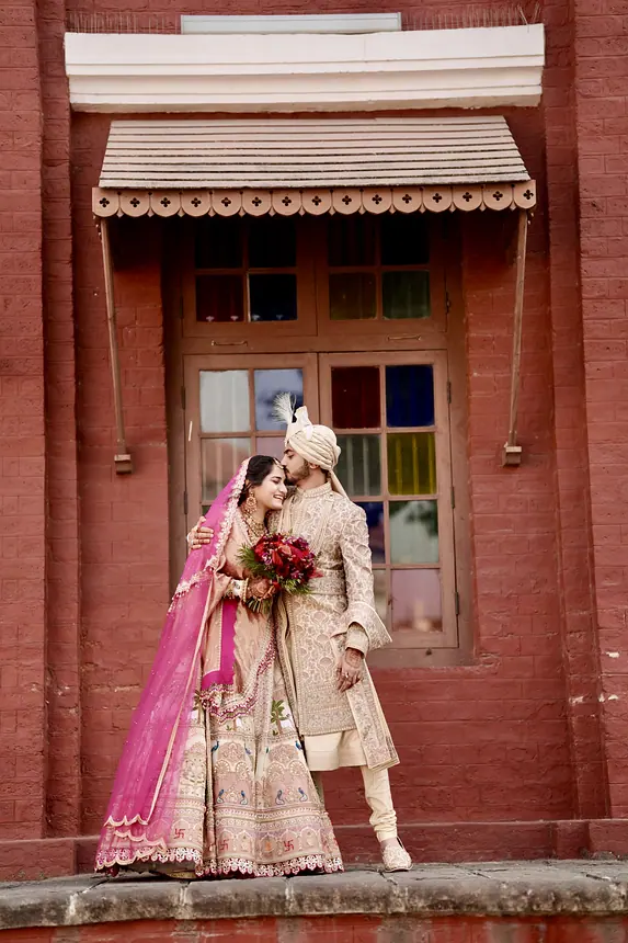Couple at a red heritage window