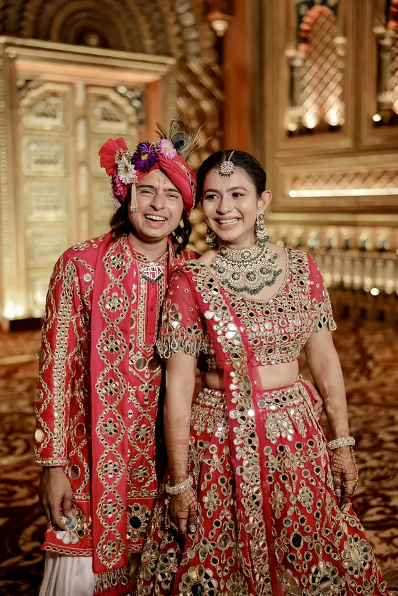 Groom and bride in red and gold